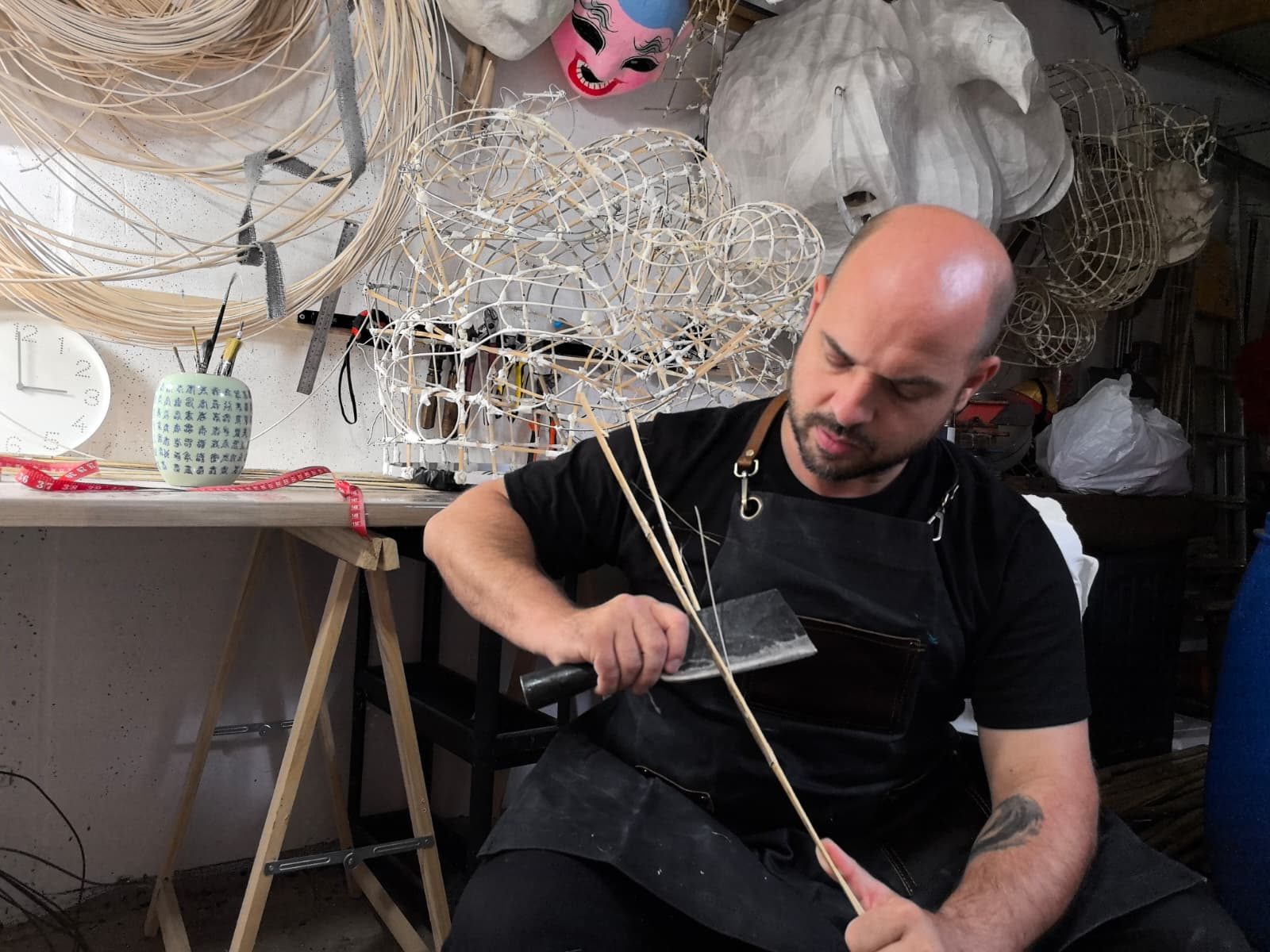 Ghyslain Kuehn splitting bamboo for a new frame