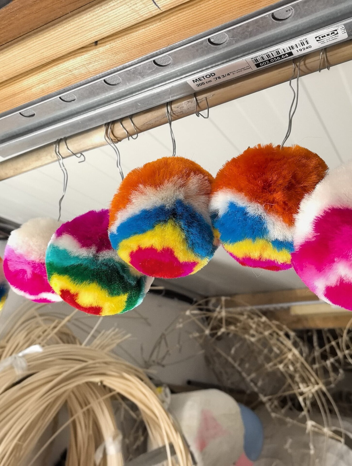 Silk pompoms drying in the workshop