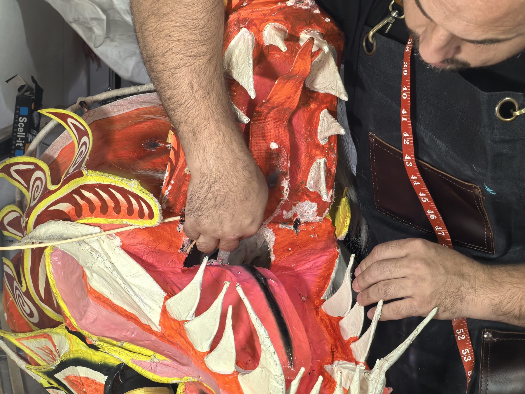 Restoring a painted lion head